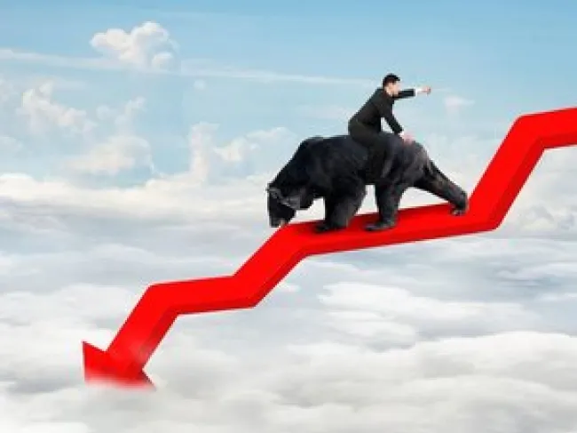 The Fed Passes the Buck: Blame Oil and China